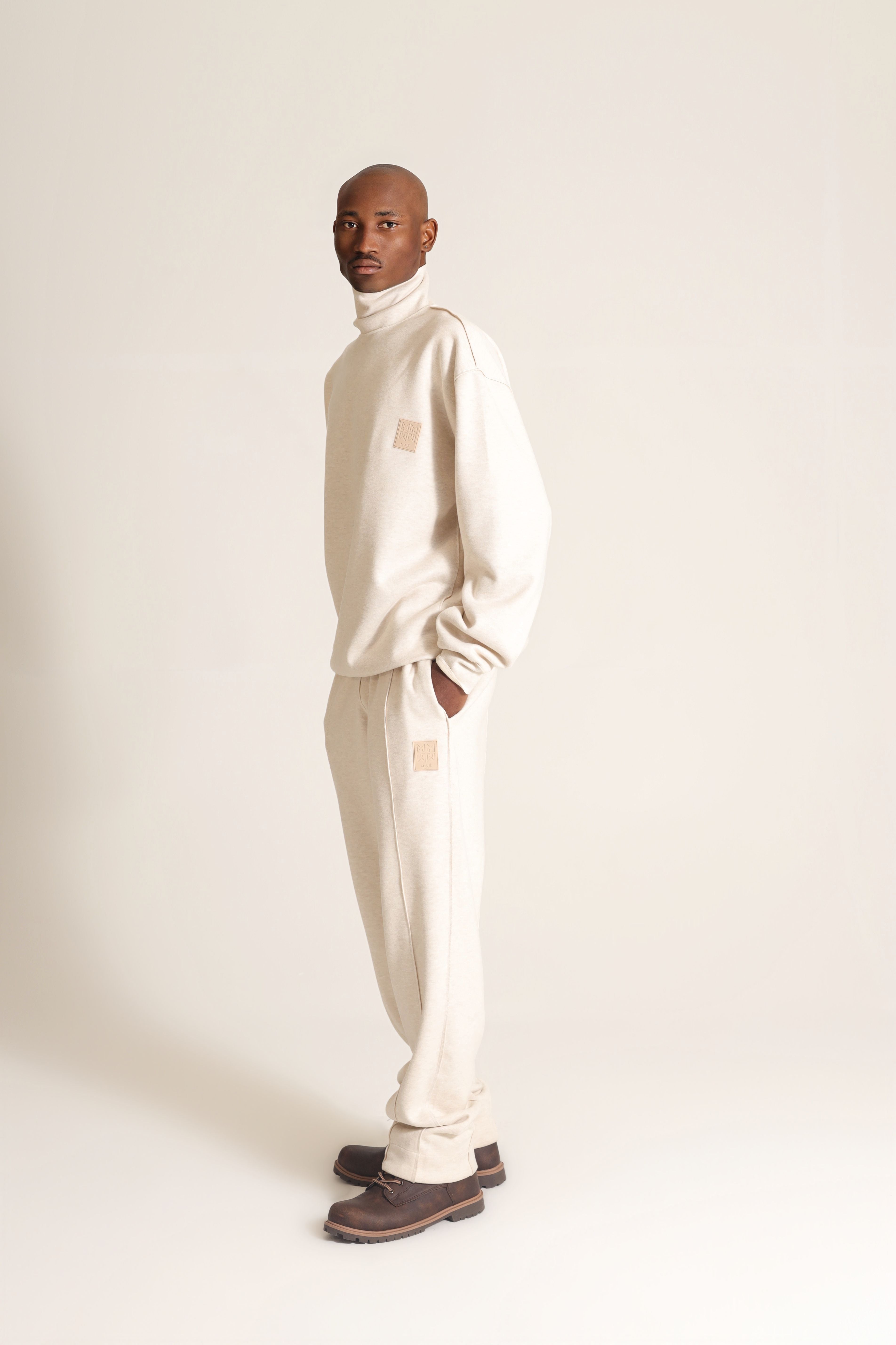 HIGH NECK SWEATER LOGO PATCH IN BEIGE