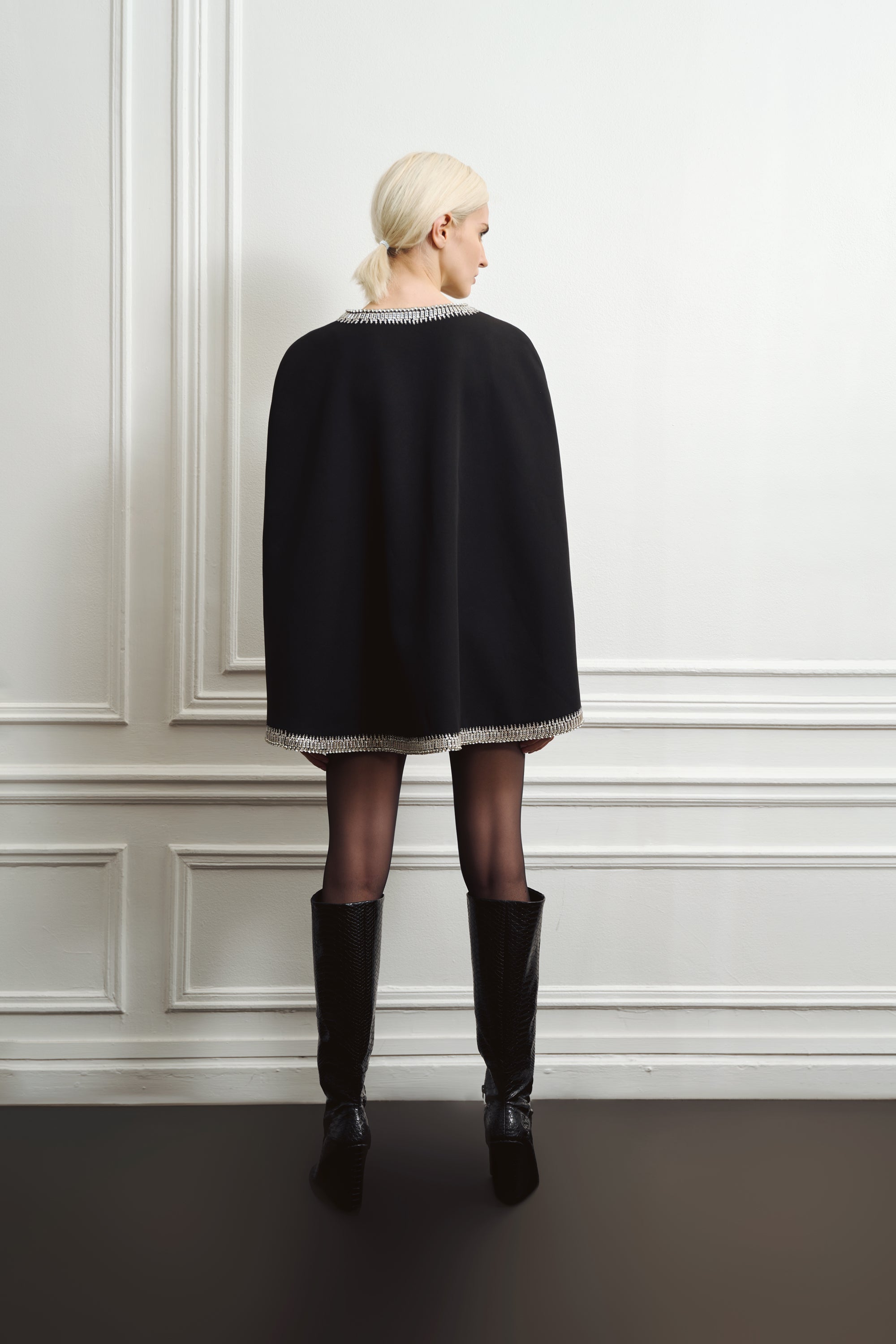 Short black cape adorned with crystals